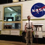 Tom Sachs Tom Sachs standing in front of his Space Mobie