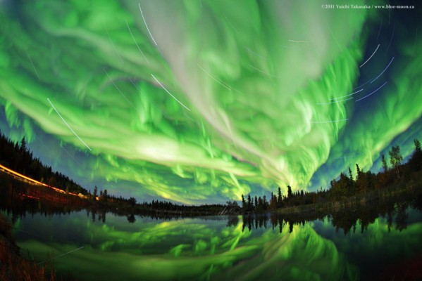 Green swirls of light from the aurora borealis.