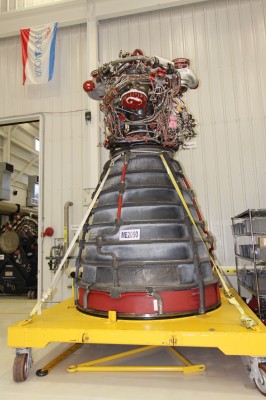 A space shuttle main engine stands alone.