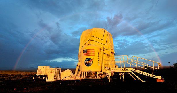 A picture of the NASA Habitat Demonstration Unit at sunset.